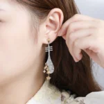 kf-S6b48d4a264354d7487b017010683df8fl-HAIKE-S925-Sterling-Silver-Earrings-Original-Apricot-Leaf-Pipa-Style-Earpin-Two-tone-Design-Advanced-Fashion